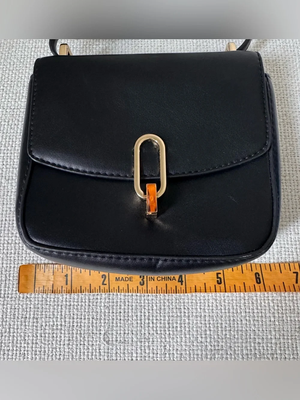 Target Classic Black Mini Crossbody Bag with Gold Hardware and Amber Accent